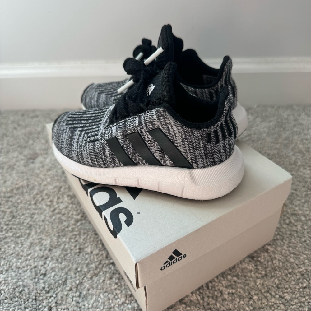 Adidas Black and White Sneakers with Sleek Design